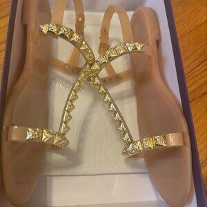 Stuart Weitzman Jelrose Nude Jelly T-Strap Sandals Gold Studs Crystals